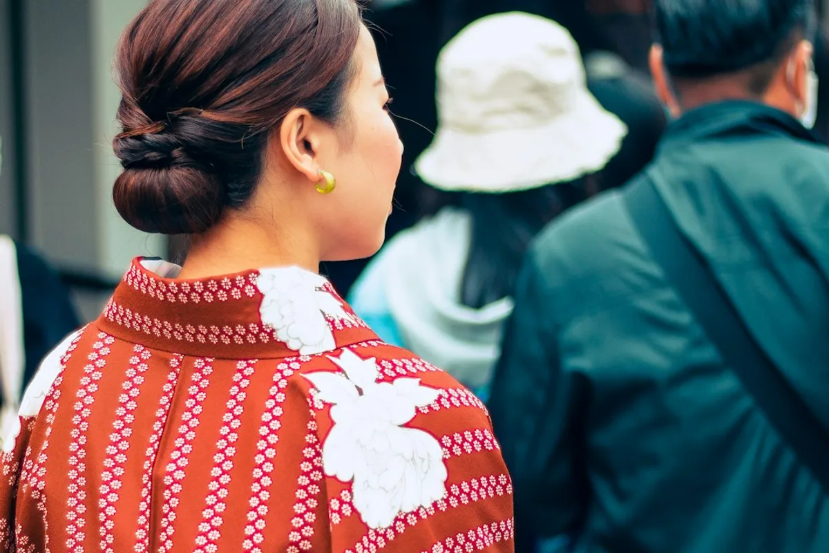 Visitors in rented kimono walking the lanes of Higashiyama, Kyoto