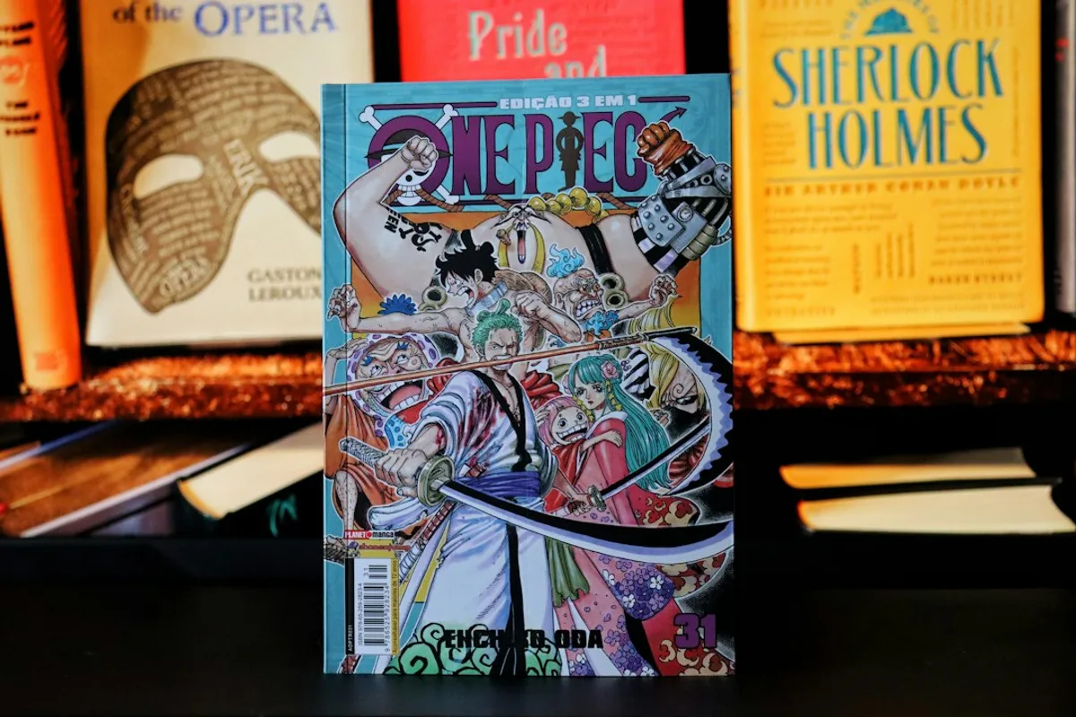 Manga volumes lined up on a shelf